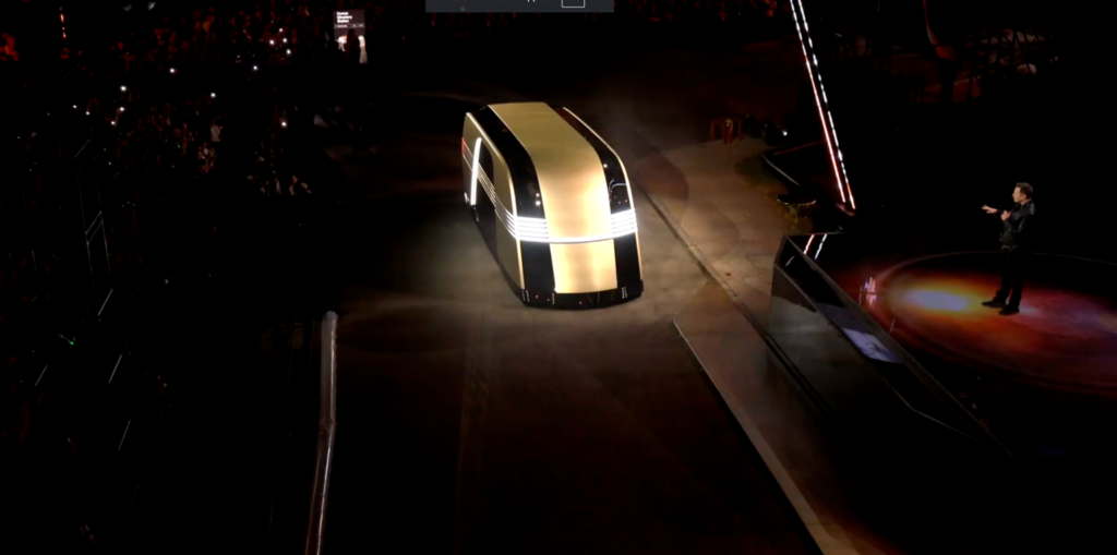 Elon Musk unveiling the Robovan at Tesla’s We, Robot event